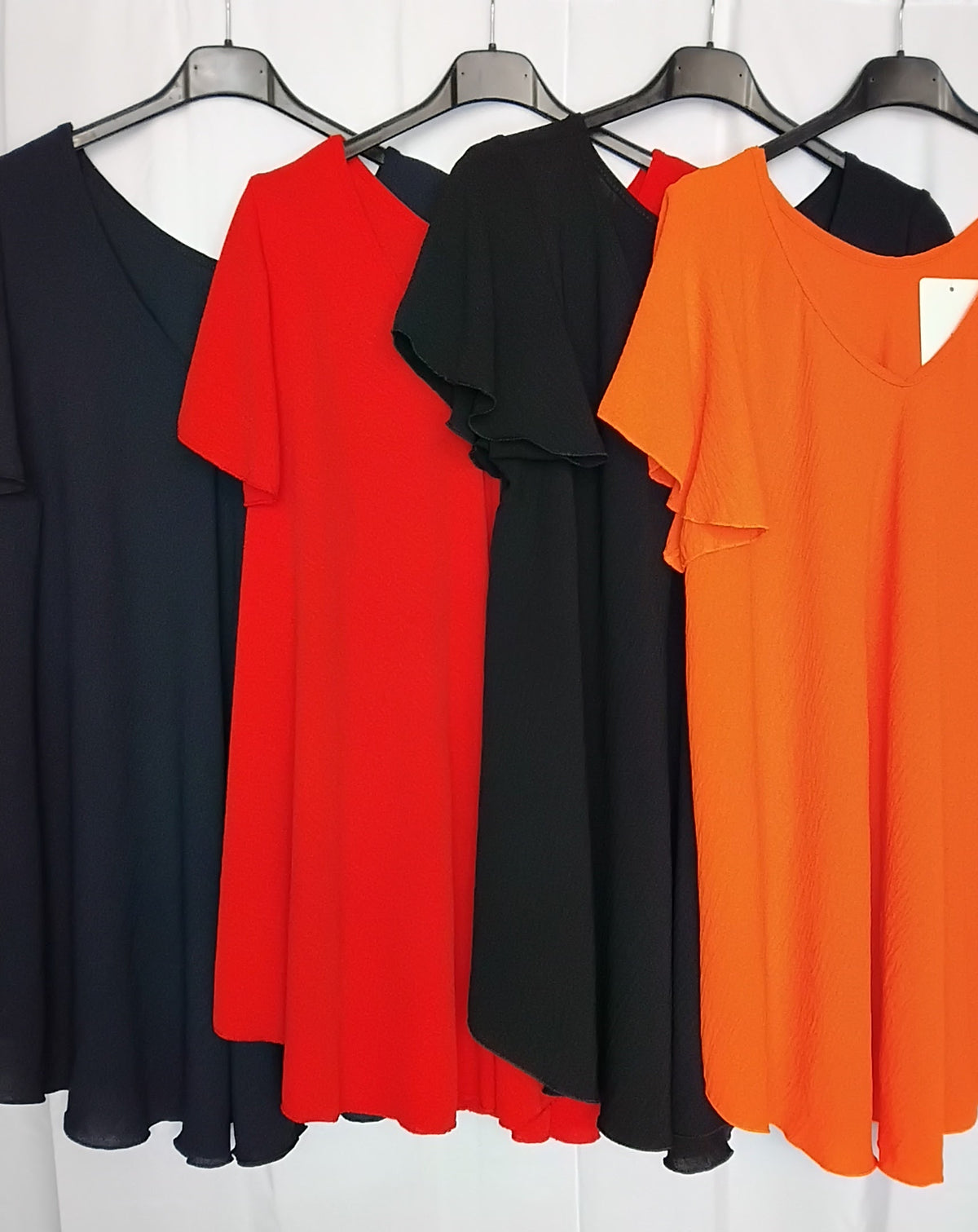 Blouse fluide · Col V · Coupe pyramide · 4 couleurs · TU46-52