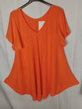 Blouse fluide · Col V · Coupe pyramide · 4 couleurs · TU46-52