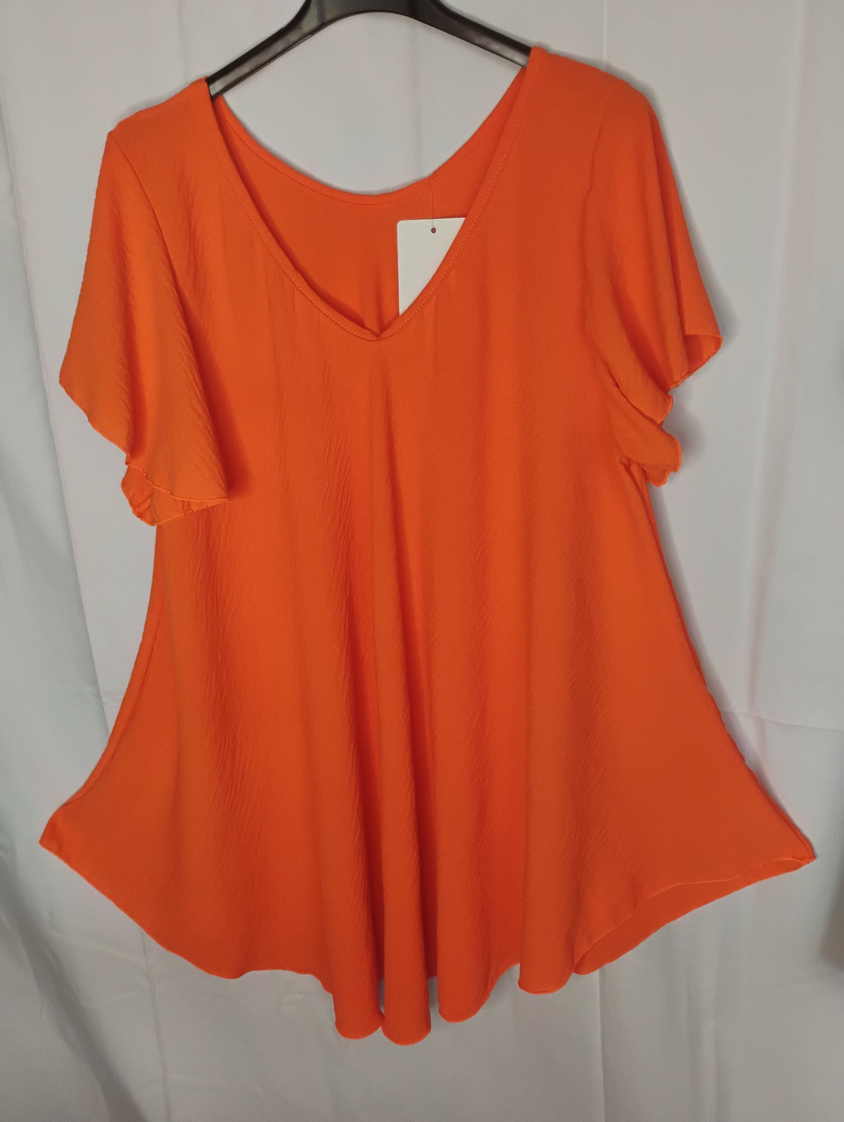 Blouse fluide · Col V · Coupe pyramide · 4 couleurs · TU46-52