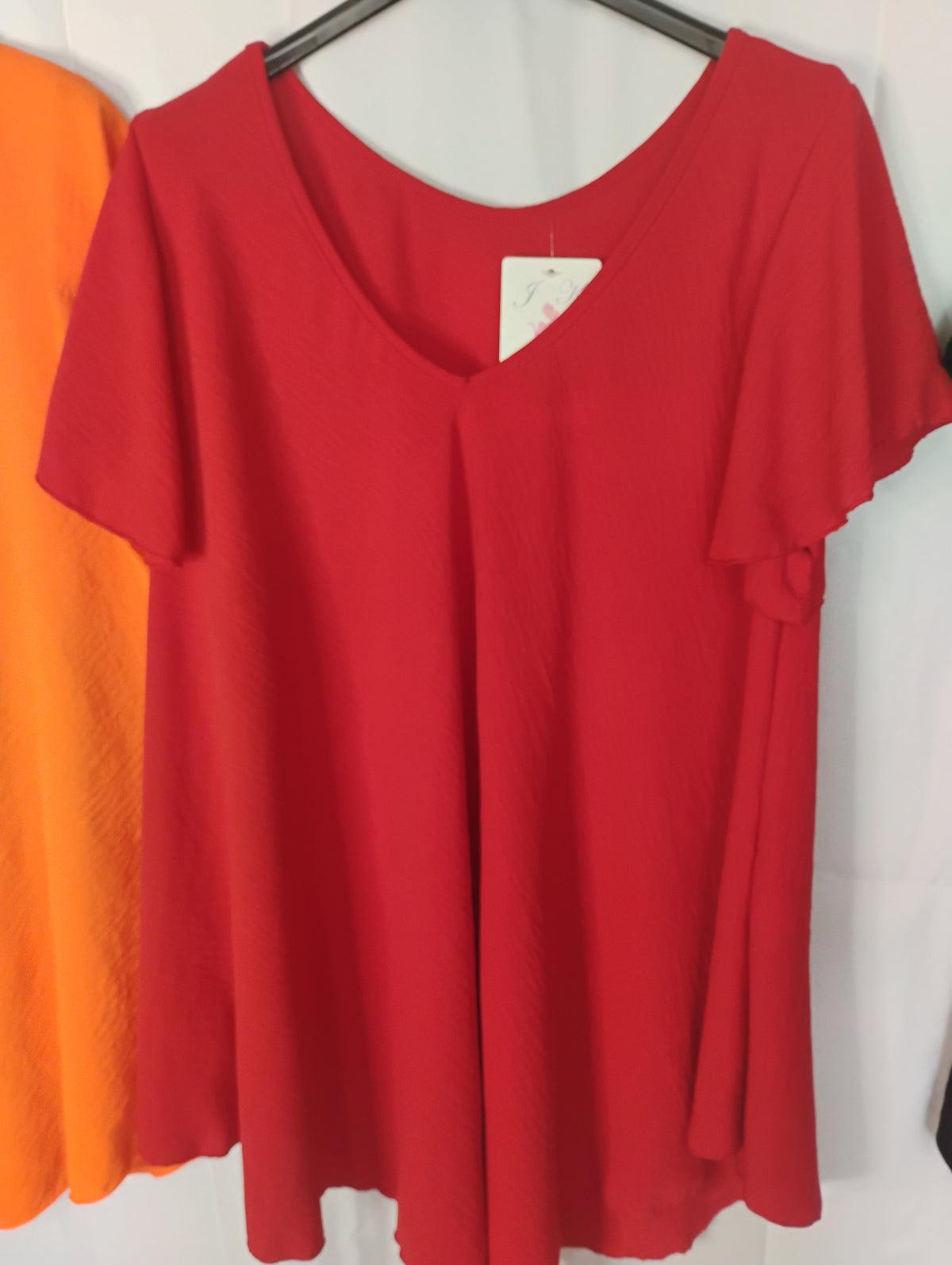 Blouse fluide · Col V · Coupe pyramide · 4 couleurs · TU46-52