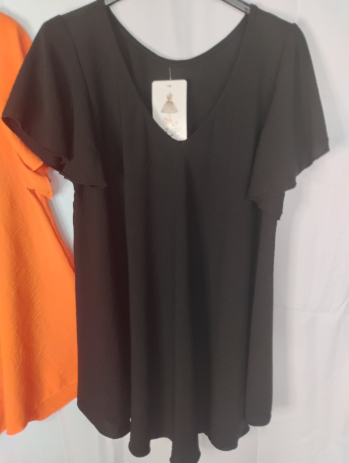 Blouse fluide · Col V · Coupe pyramide · 4 couleurs · TU46-52