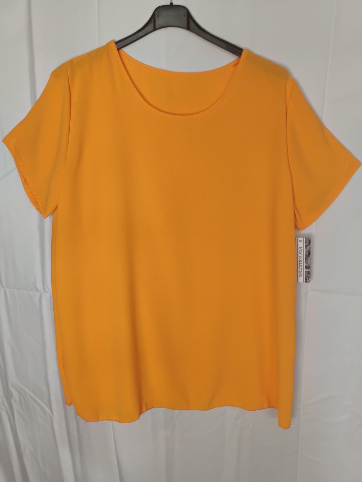 Blouse fluide · Col rond · Manches courtes · 14 couleurs · TU48-54